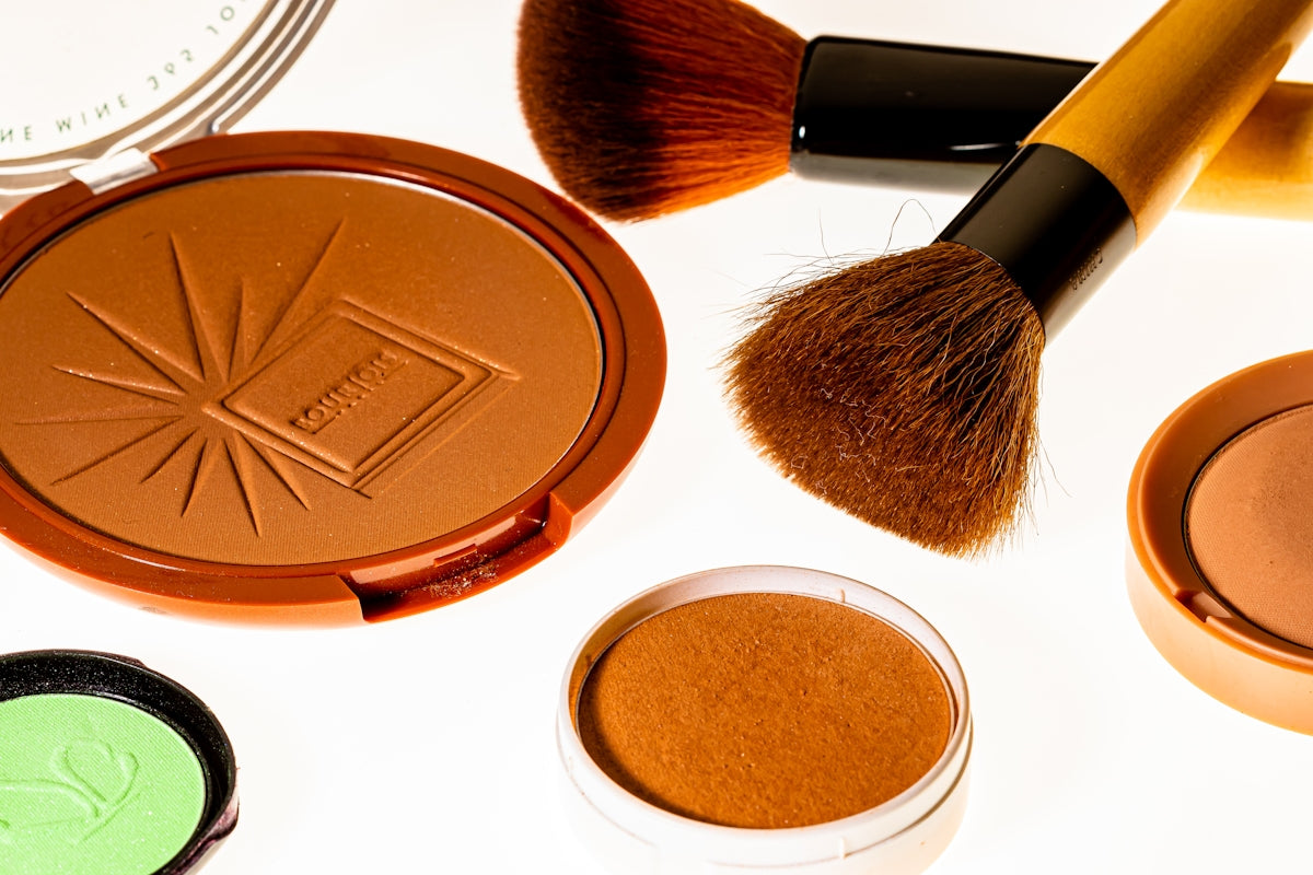 brown and black makeup brush