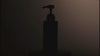 dark body lotion pump bottle